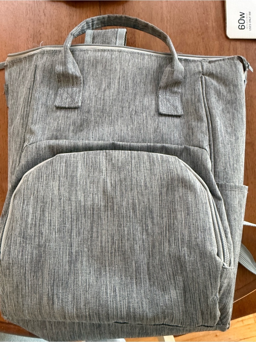Small backpack with compartments for baby bottles insulated